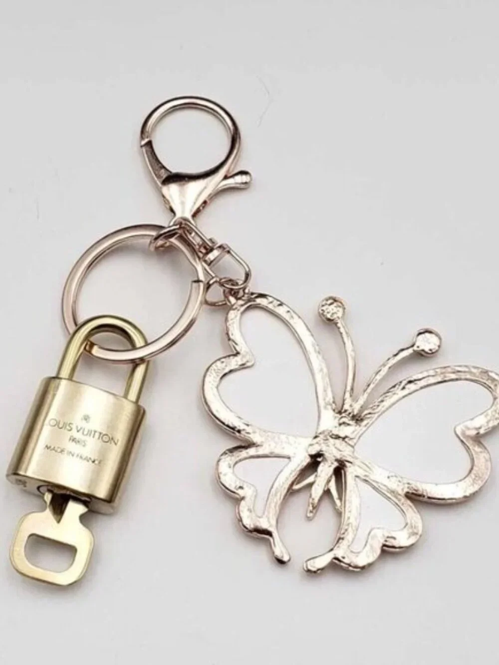 Authentic Louis Vuitton Gold Lock 🔒 Unbranded Butterfly Keychain Bag Charm LV